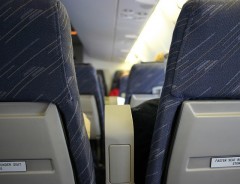 Scaunele din avion se vor extinde pentru pasagerii de talie mare